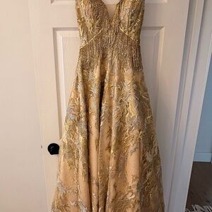 Elegant Gold and Cream Gown